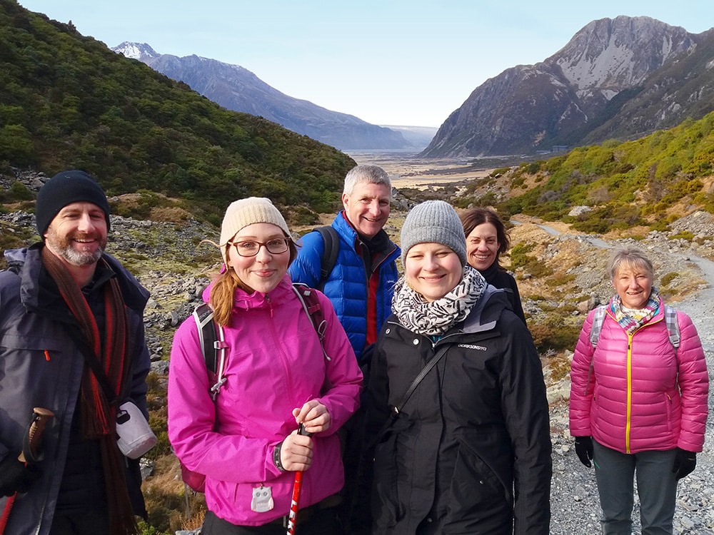 Walkers enjoying winter sunshine in Mt Cook National Park