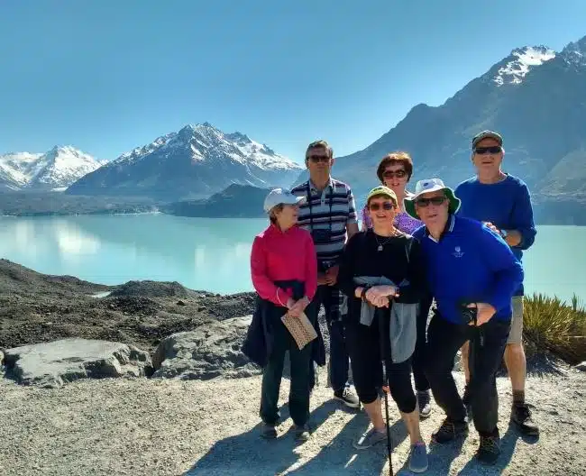 Senior travellers exploring the Tasman Glacier in Mt Cook