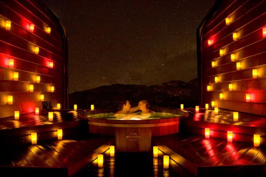 Private hot pool by candlelight - Relaxing Tours NZ