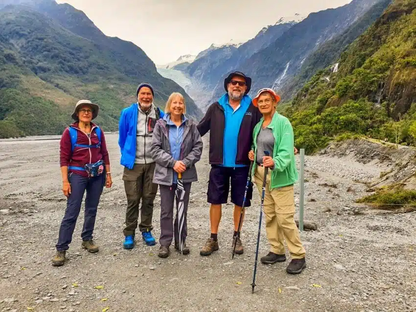 MoaTrek guests and Kiwi guide Tim walking at Franz Josef Glacier