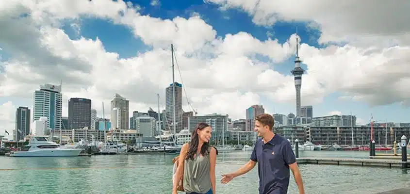 Balanced lifestyle is one reason to move to New Zealand - Couple walking in Auckland