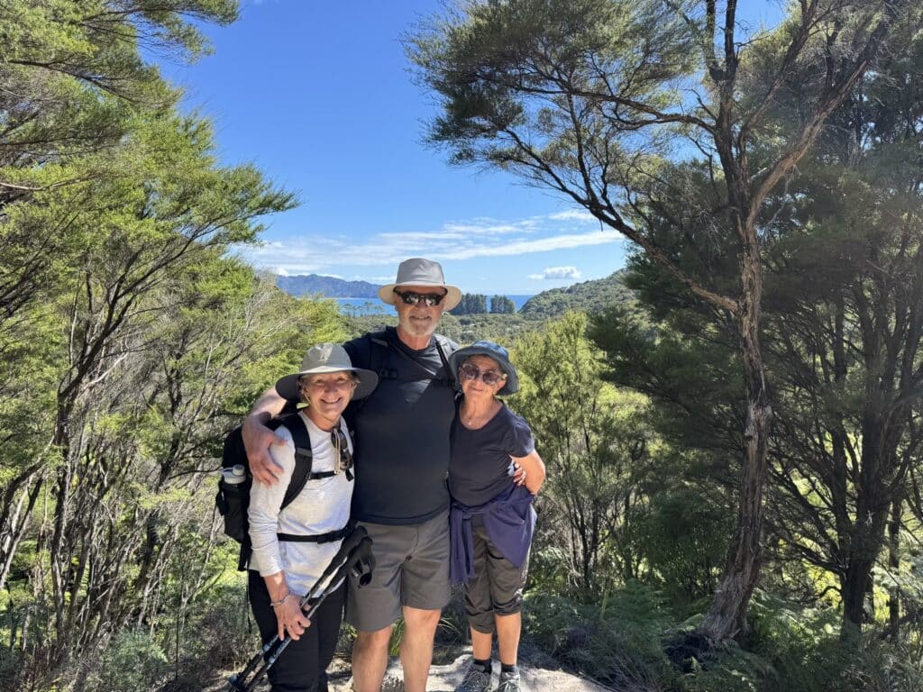 Senior travellers at the lookout in Abel Tasman National Park, New Zealand