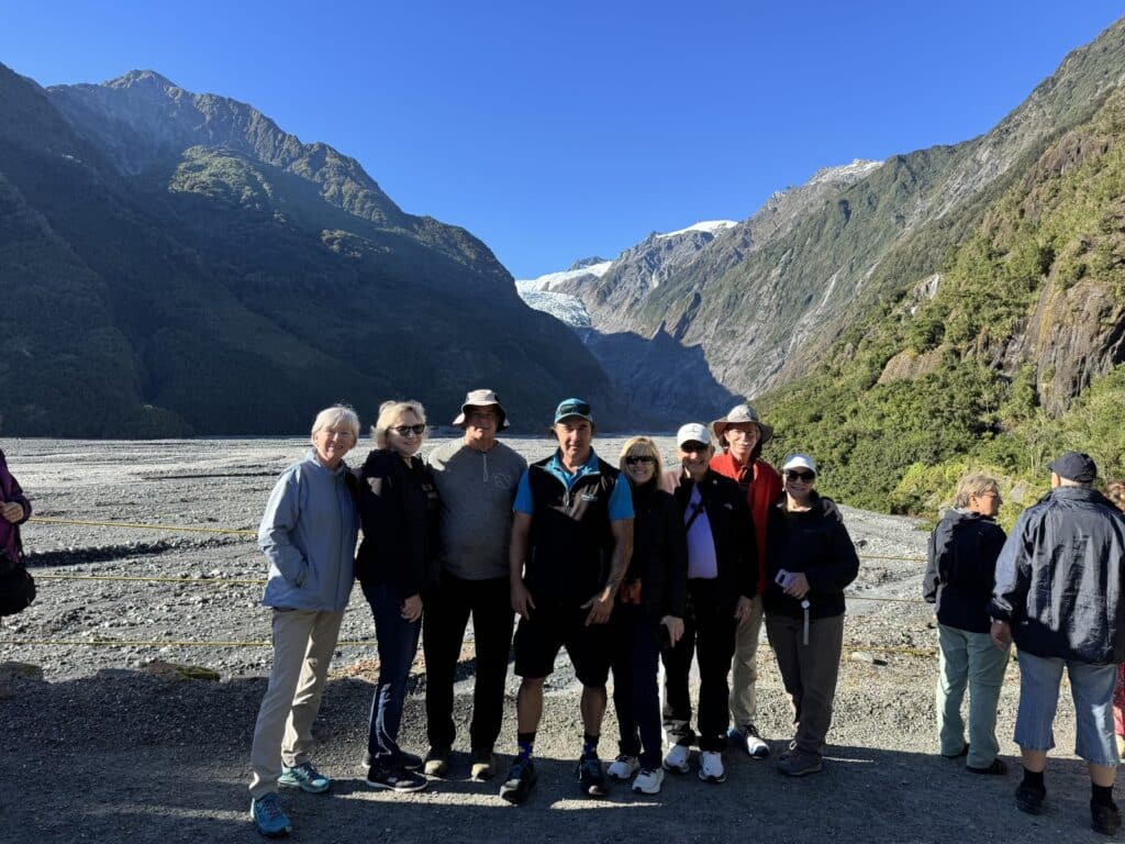 Walkers and MoaTrek guide in the Franz Josef Glacier Valley, New Zealand