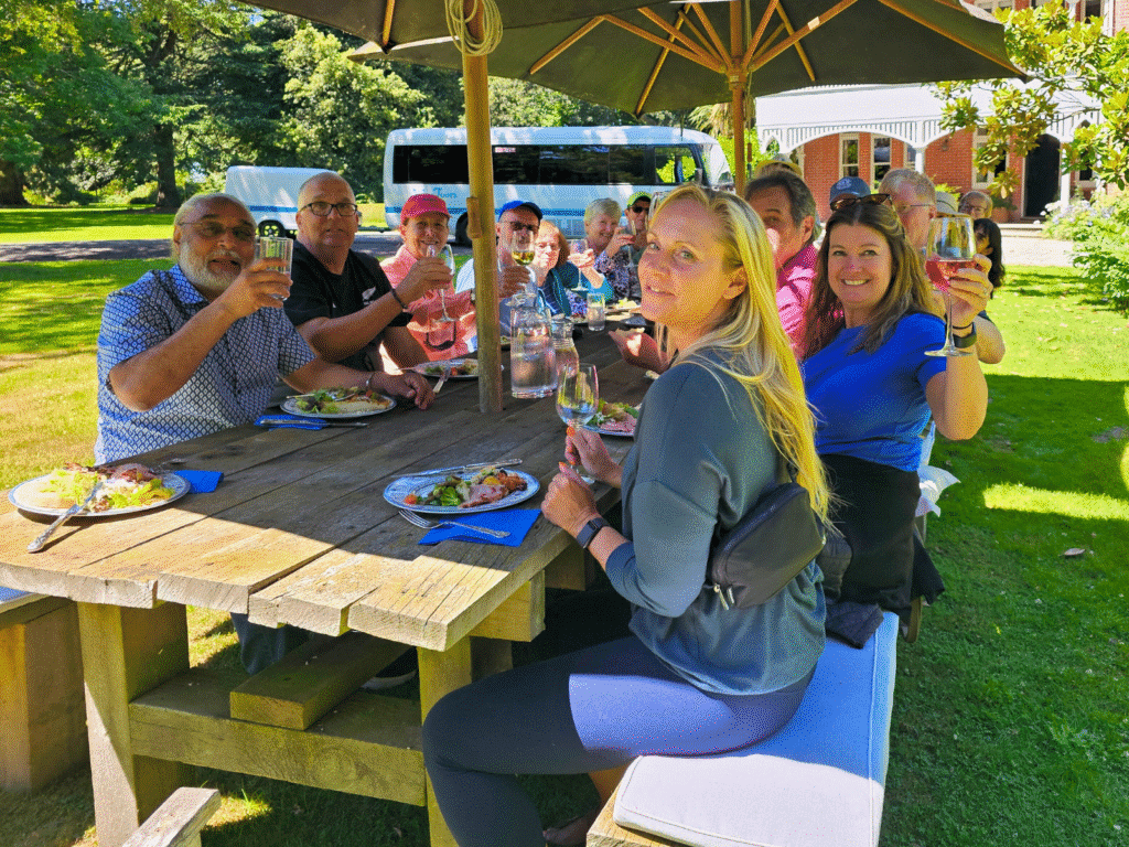 Travellers enjoying a garden lunch in Canterbury, New Zealand