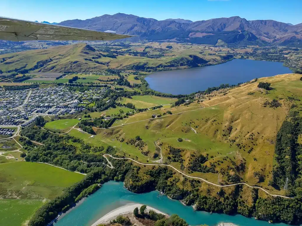 Views of Queenstown and Lake Hayes from a scenic flight